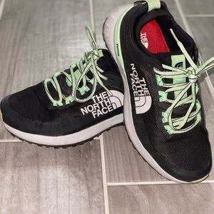 The North Face Women’s Ultra Traction trail running shoes in black/ green ash